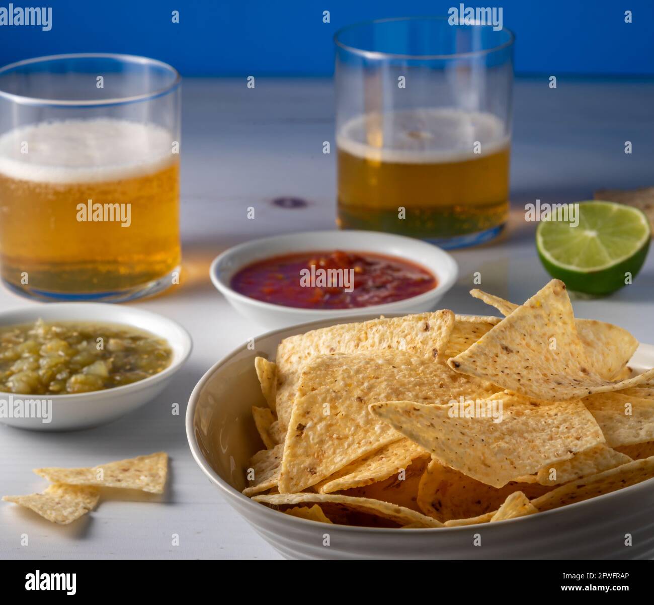 Fresh tortilla chips and beer. Stock Photo