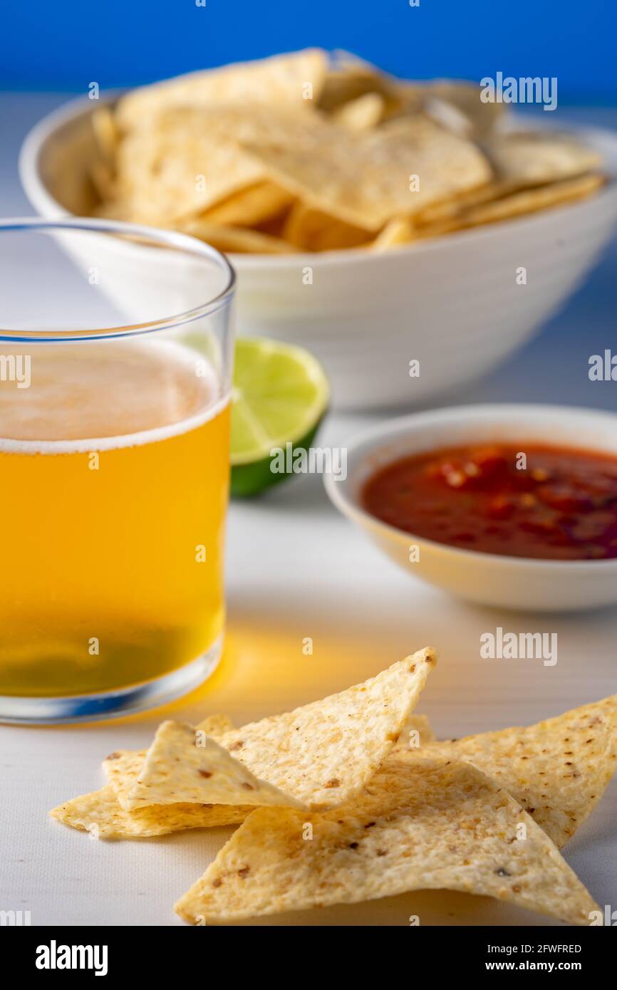 Fresh tortilla chips and beer. Stock Photo