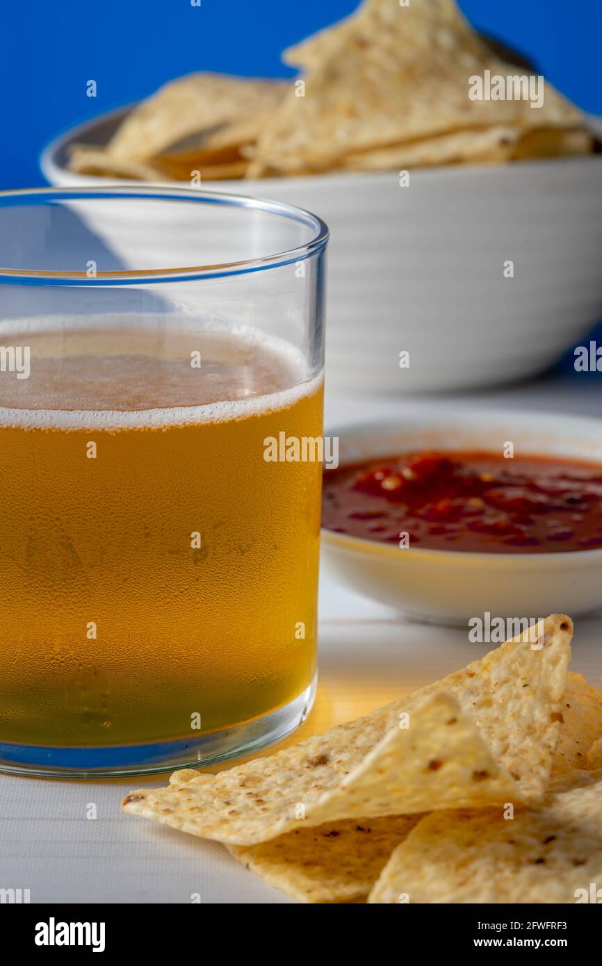 Fresh tortilla chips and beer. Stock Photo