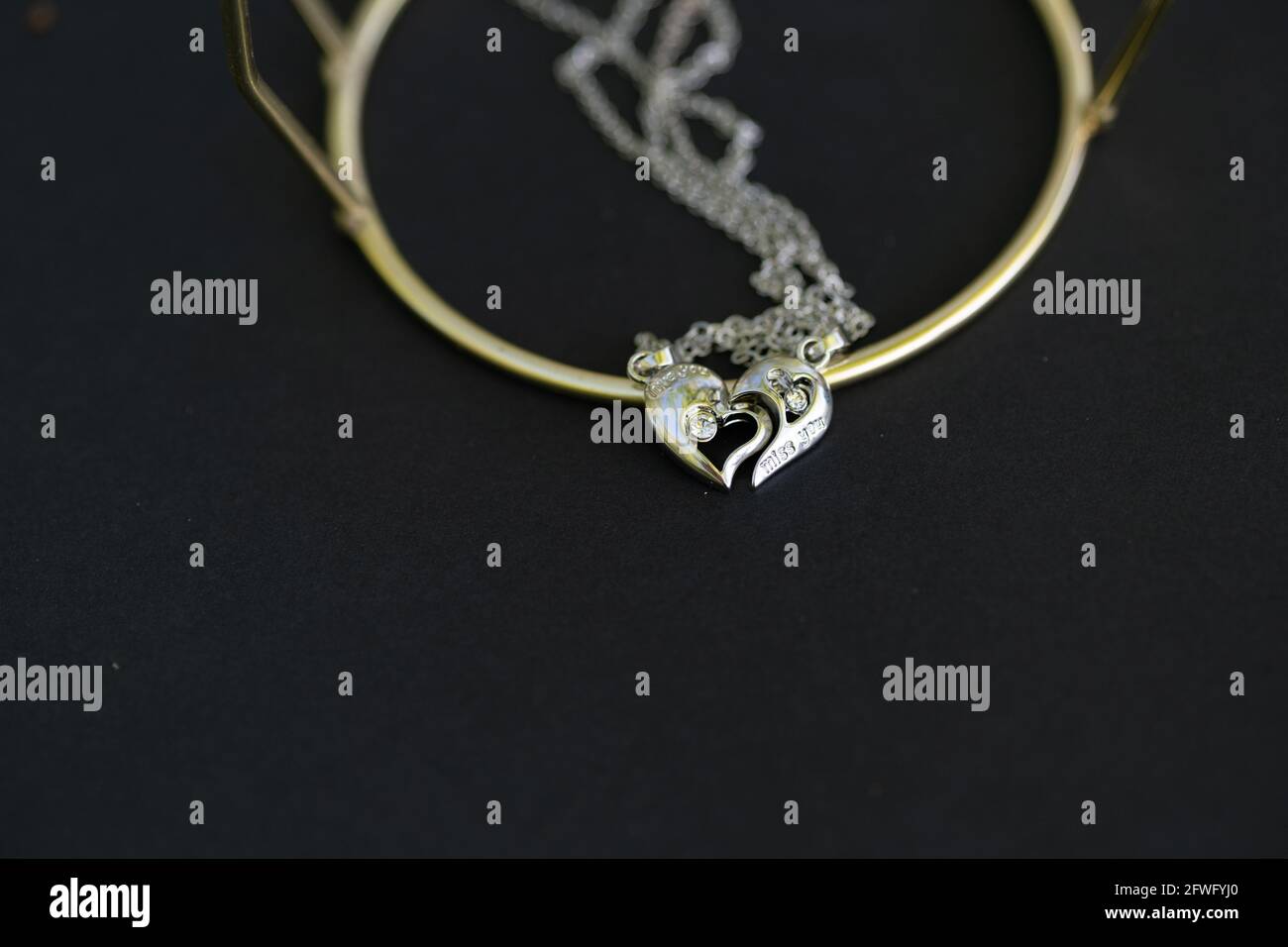 Half heart necklace hi-res stock 
