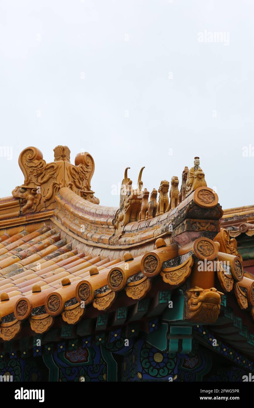Close-up of Roof Statues on The Hall of Imperial Peace in The Imperial Gardens of The Forbidden City Palace Museum in Beijing, China. Stock Photo