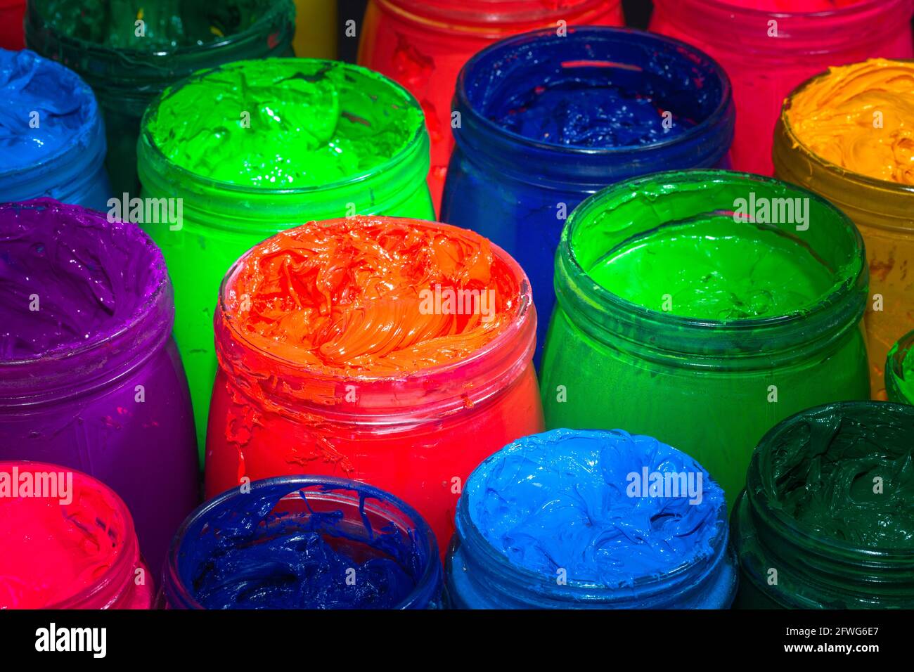 the red of plastisol ink for print tee shirt in the glass bucket. colorful  of ink background Stock Photo - Alamy