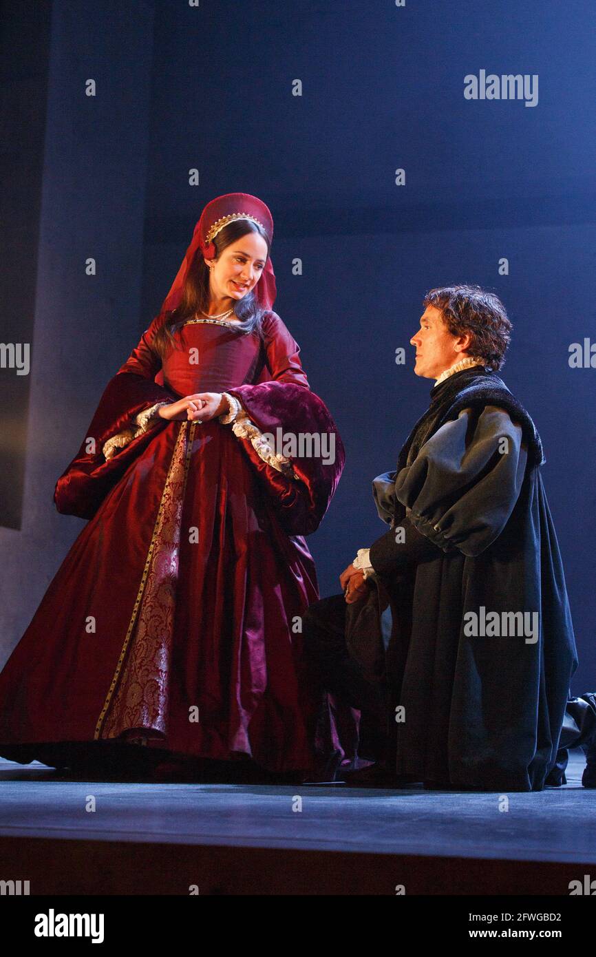 Lydia Leonard (Anne Boleyn), Ben Miles (Thomas Cromwell) in WOLF HALL by Hilary Mantel at the Royal Shakespeare Company (RSC), Aldwych Theatre, London WC2  17/05/2014  adapted for the stage by Mike Poulton  design: Christopher Oram  lighting: Paule Constable  director: Jeremy Herrin Stock Photo