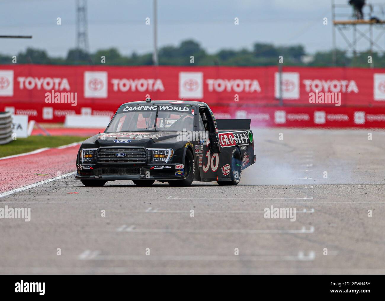 Austin. 22nd May, 2021. NASCAR Camping World Truck Series driver Todd Gilliland (38) celebrates a win in the Toyota Tundra 225 at Circuit of the Americas in Austin, Texas, on May 22, 2021. Credit: Scott Coleman/ZUMA Wire/Alamy Live News Stock Photo