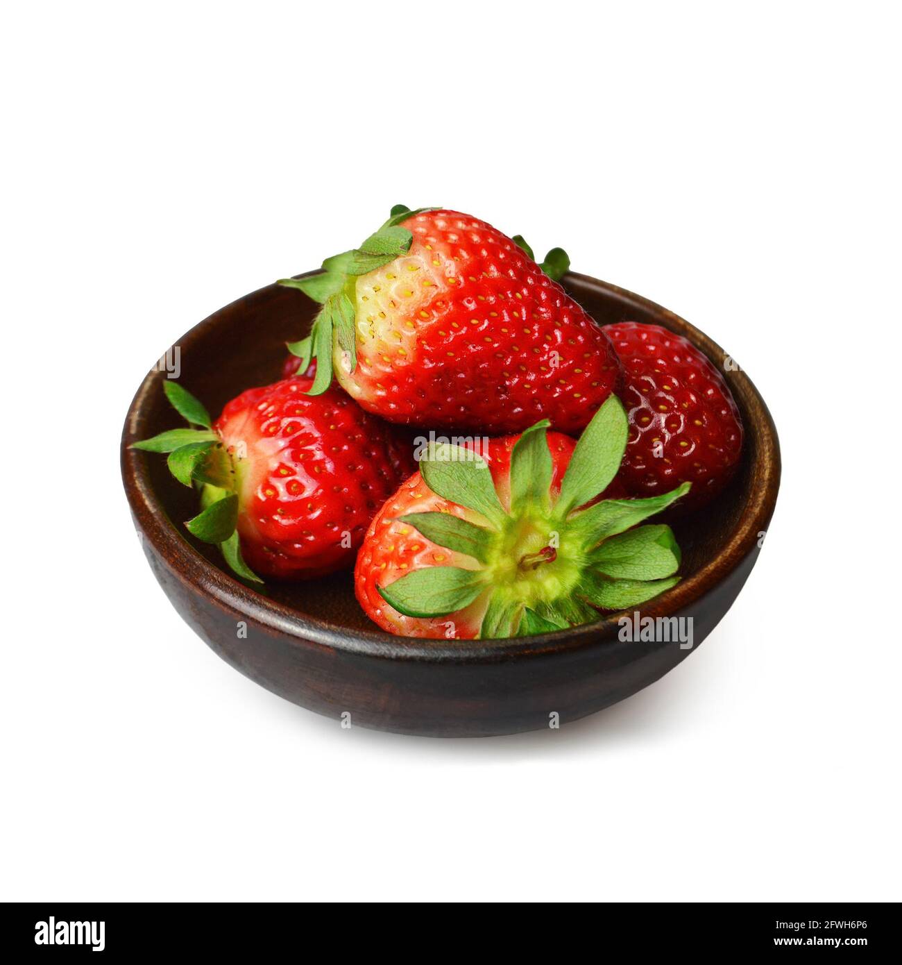 Strawberries in a bowl isolated on white background Stock Photo - Alamy