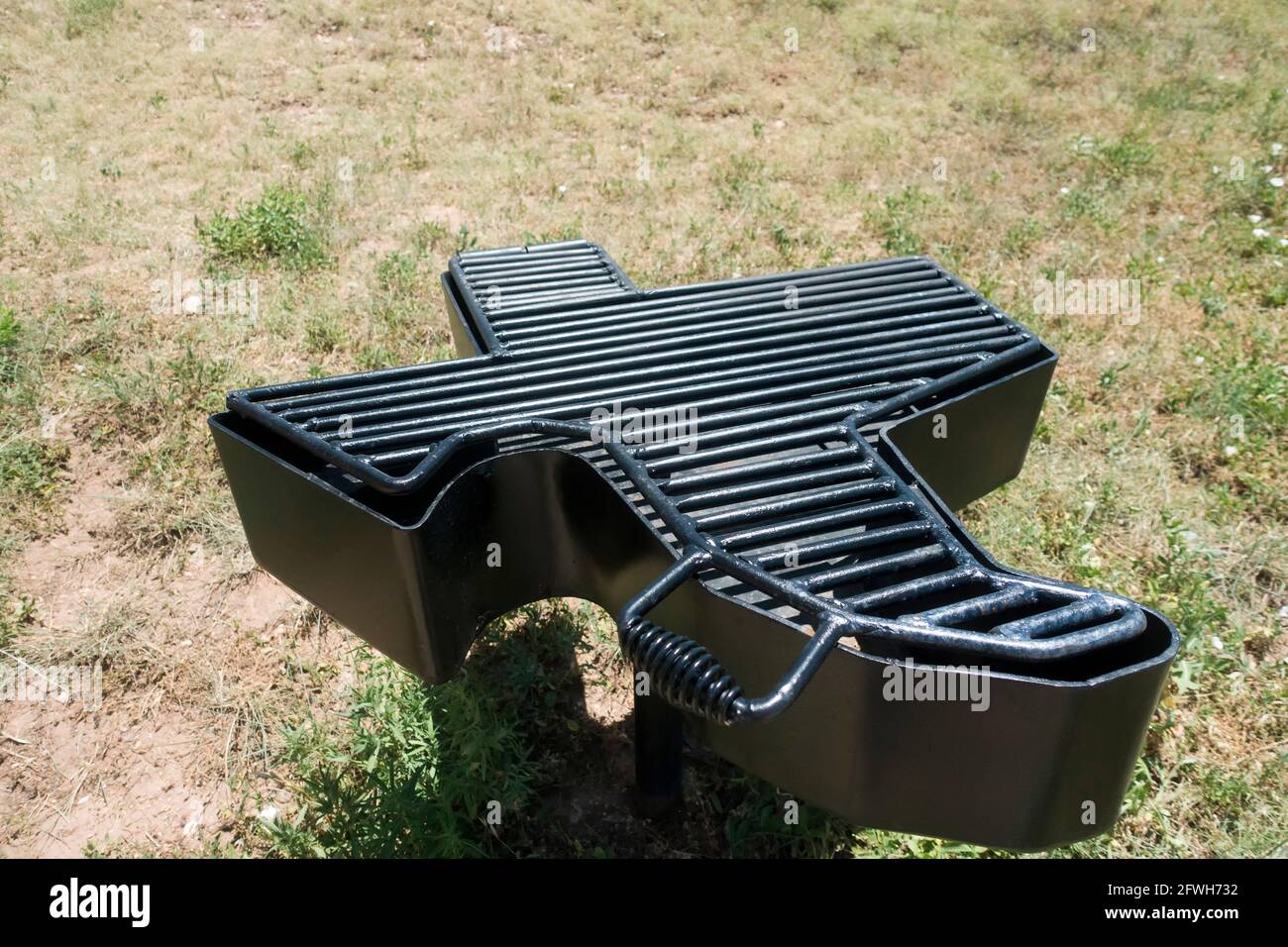 Barbecue grill shaped in the State of Texas in a public park - Texas USA Stock Photo