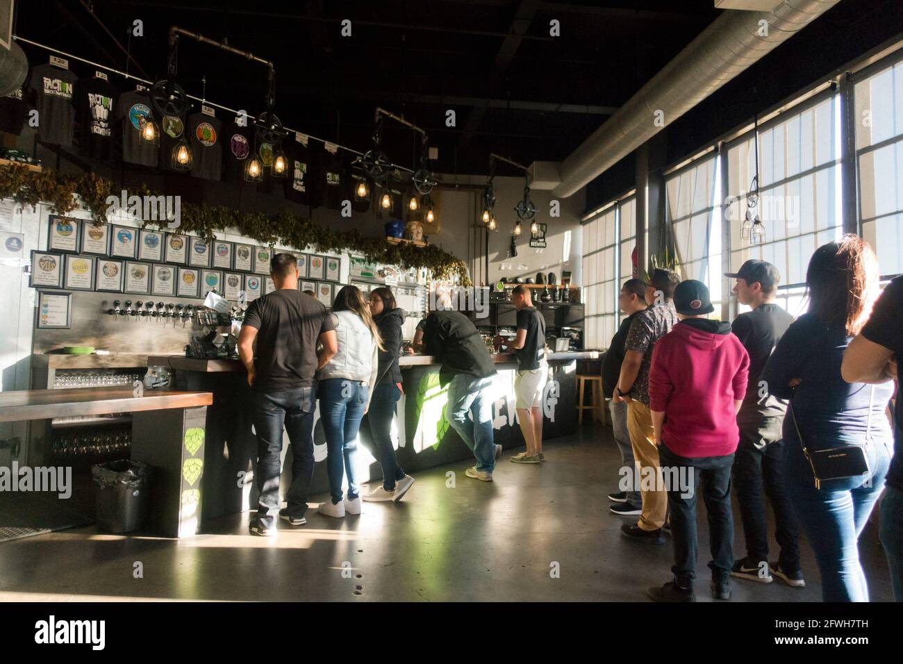 Patrons ordering beer in micro brewery - USA Stock Photo