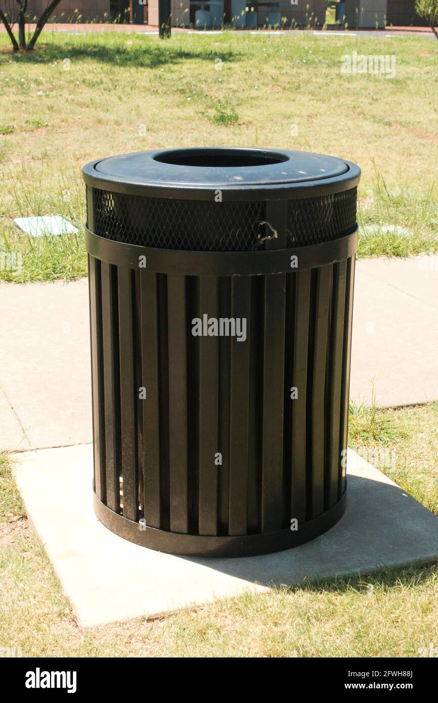 Trash can (rubbish bin) at public park - USA Stock Photo