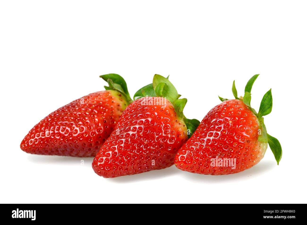 Fresh strawberries isolated on white background Stock Photo - Alamy