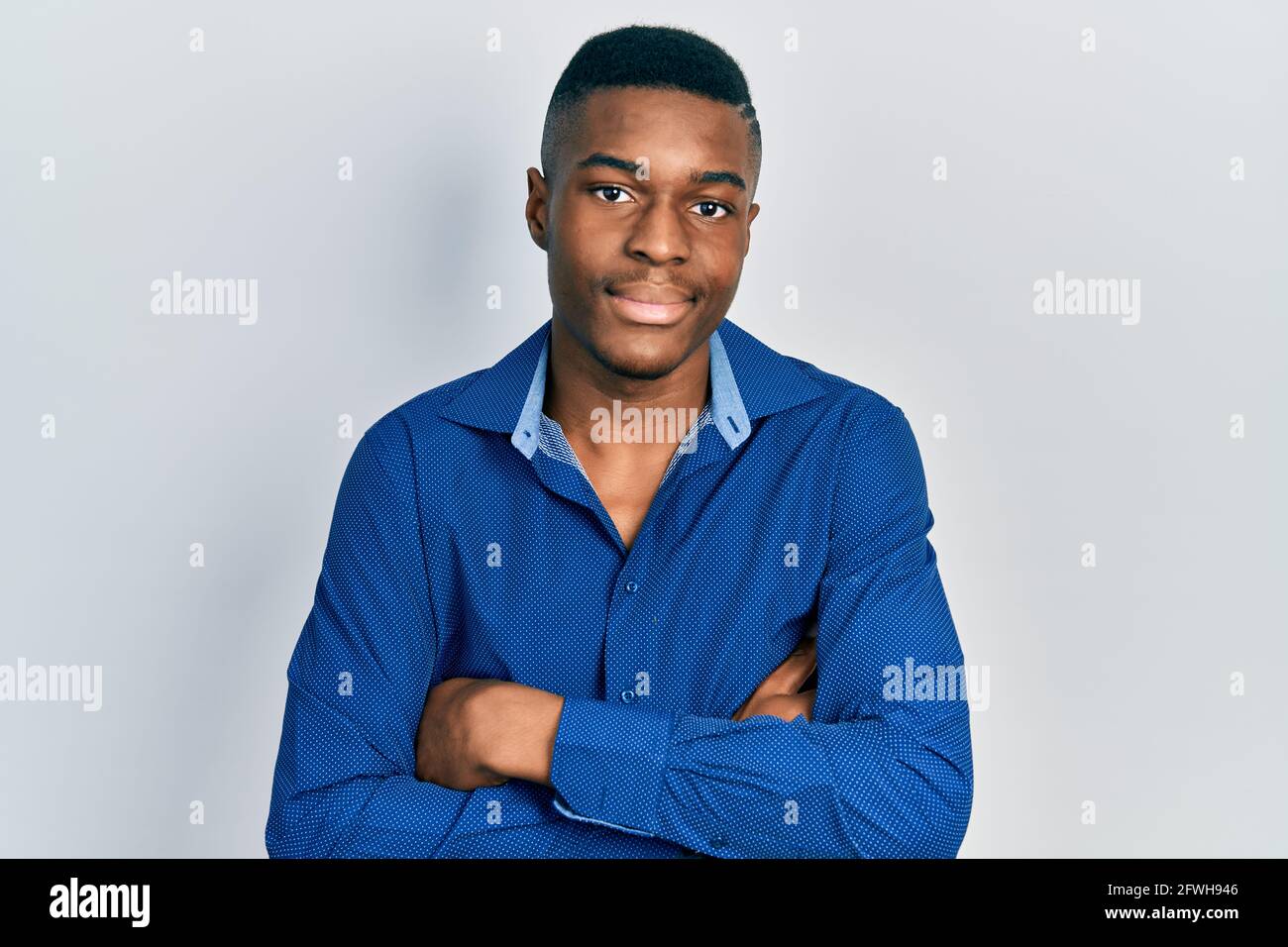 Young african american man wearing casual clothes happy face smiling ...