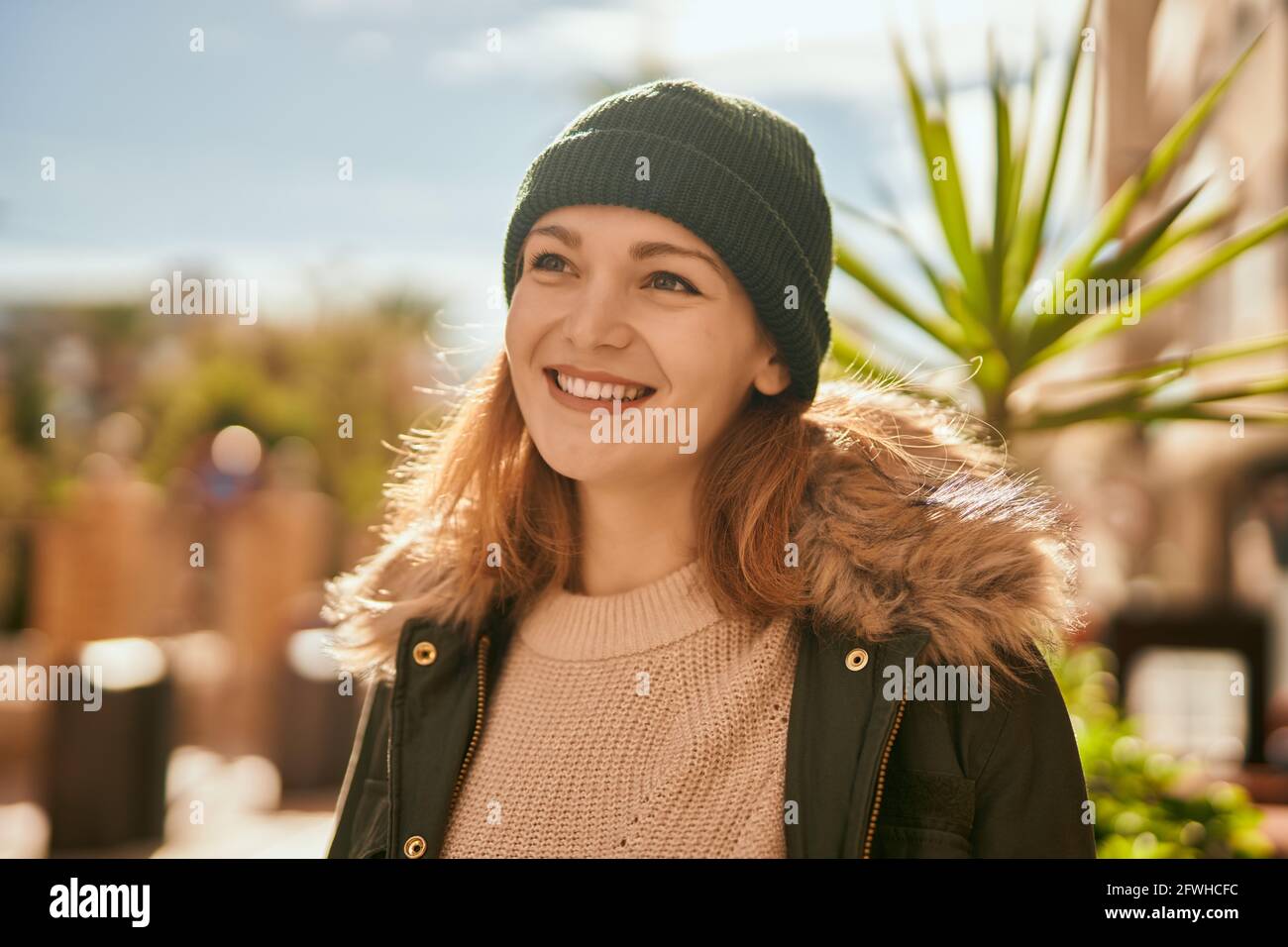 Young caucasian girl smiling happy standing at the city Stock Photo - Alamy