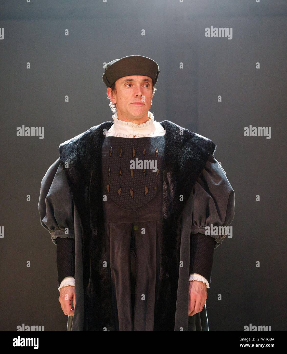 Ben Miles (Thomas Cromwell) in WOLF HALL by Hilary Mantel at the Royal Shakespeare Company (RSC), Swan Theatre, Stratford-upon-Avon, England  08/01/2014  adapted for the stage by Mike Poulton  design: Christopher Oram  lighting: Paule Constable  director: Jeremy Herrin Stock Photo