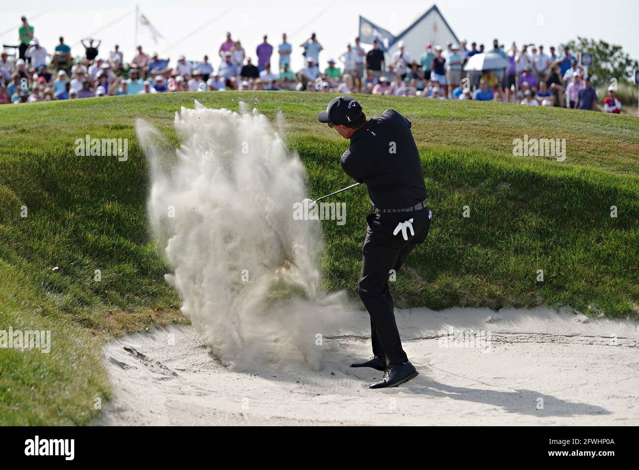 Kiawah Island, United States. 22nd May, 2021. Phil Mickelson hits a shot out of the bunker shot on the 9th hole during his third round at the 103rd PGA Championship at Kiawah Island Golf Resort Ocean Course on Kiawah Island, South Carolina on Thursday, May 22, 2021. Photo by Richard Ellis/UPI Credit: UPI/Alamy Live News Stock Photo