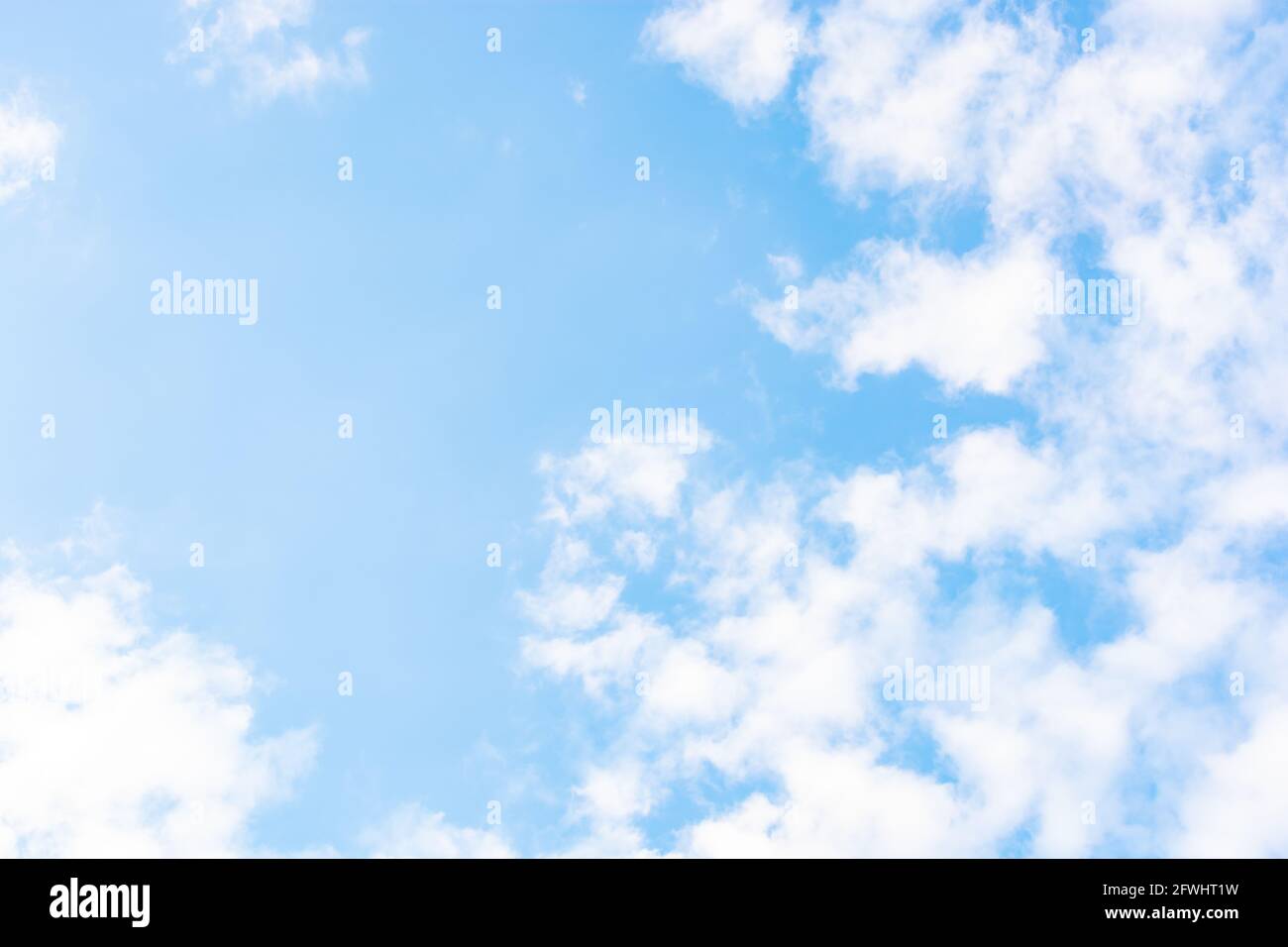 blue sky background with fluffy clouds after rain Stock Photo - Alamy