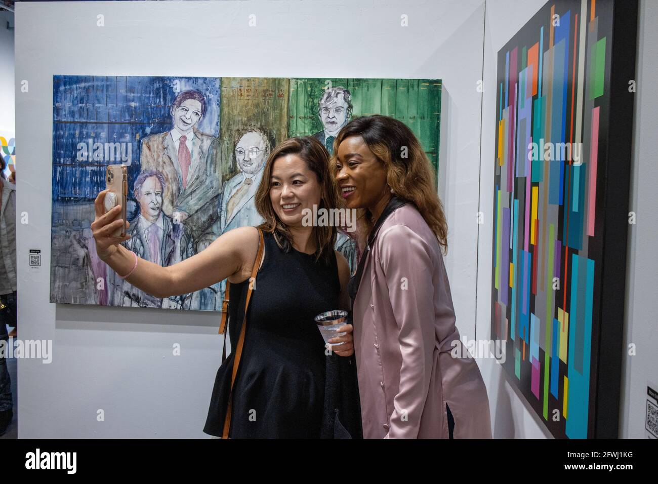 Patrons at Mash art gallery opening of the show Psych-O-Delic. 1st show after 2021 covid 19 restrictions were lifted in Los Angeles. Stock Photo