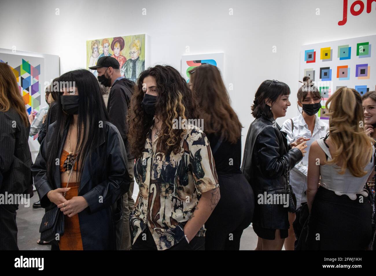 Patrons at Mash art gallery opening of the show Psych-O-Delic. 1st show after 2021 covid 19 restrictions were lifted in Los Angeles. Stock Photo