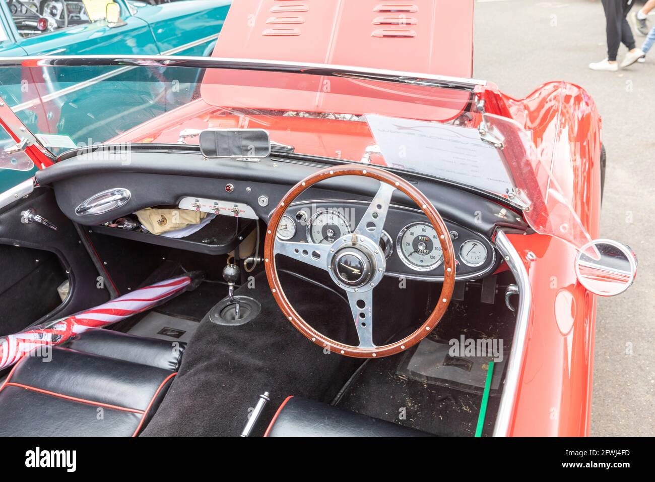 1958 red classic Austin Healey sports car at a Sydney motor car show