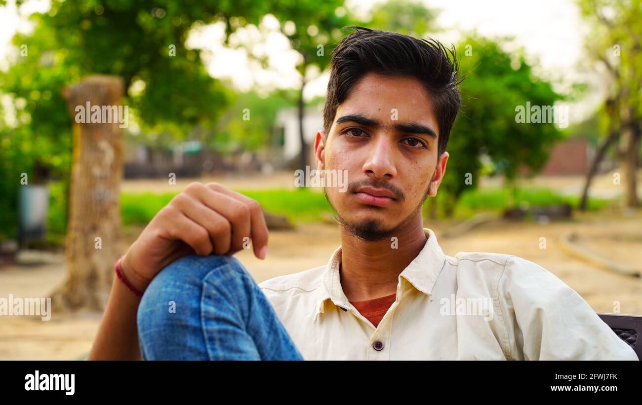 Portrait young indian man face hi-res stock photography and images - Alamy