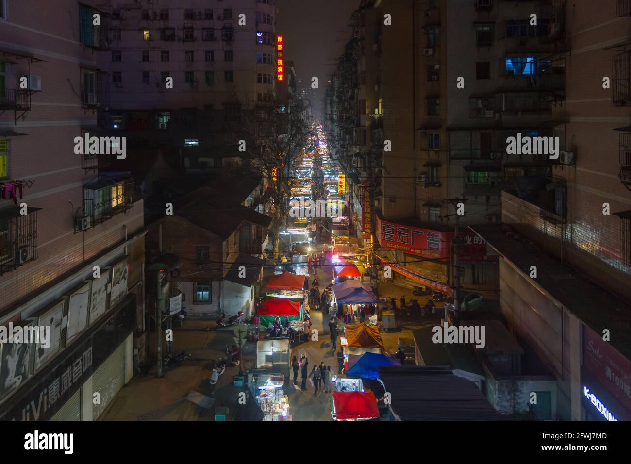Wuhan, Hubei Province, China - February 21, 2013: A night market in downtown Wuhan Stock Photo