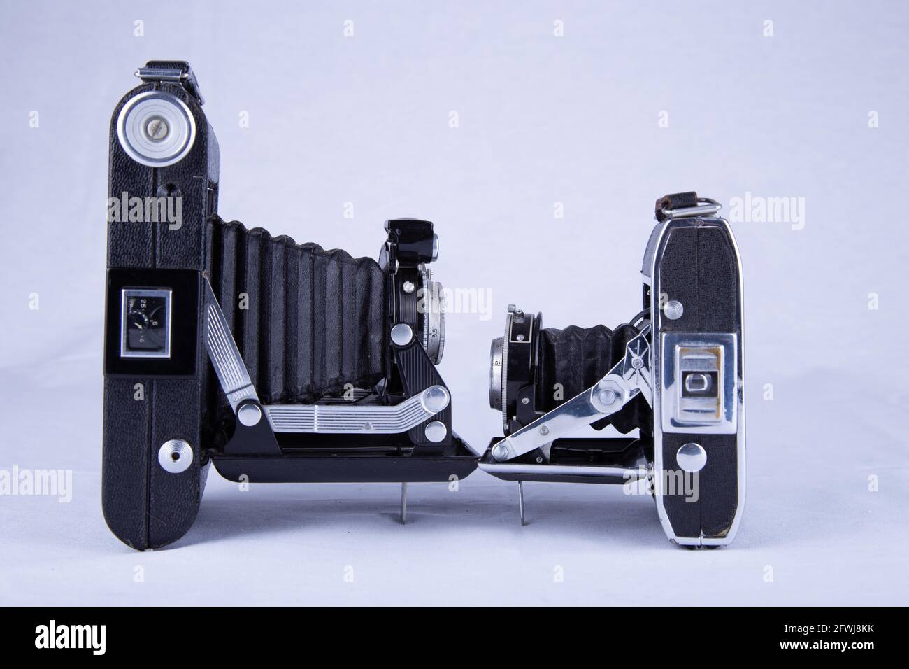 Folding Camera vs Folding Camera Stock Photo Alamy