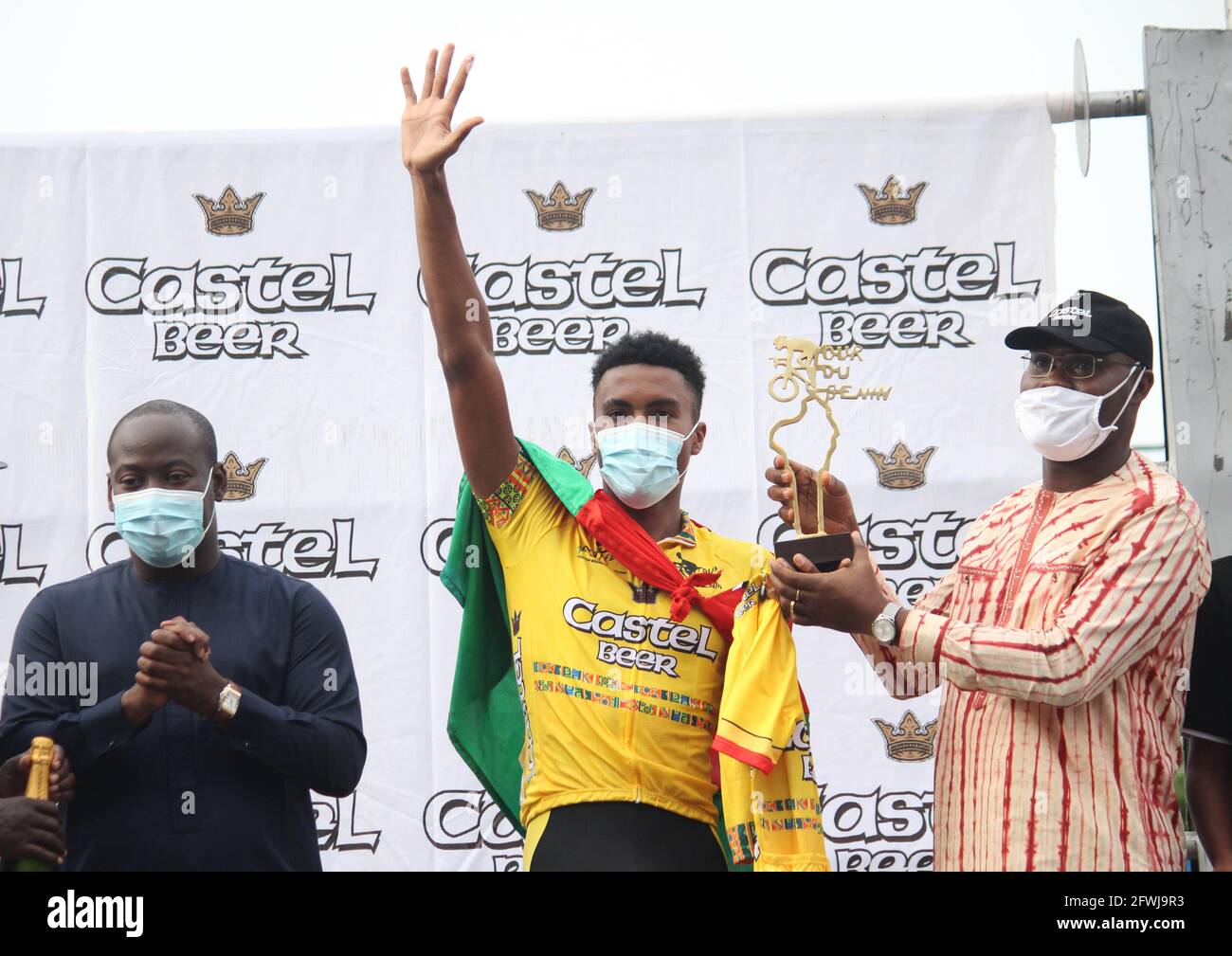 Cotonou Benin 22nd May 21 Cyclist Paul Daumont C From Burkina Faso Receives Trophy After The Final Stage Of The Benin S 16th International Cycling Tour In Cotonou Benin May 22 21 21 Year Old