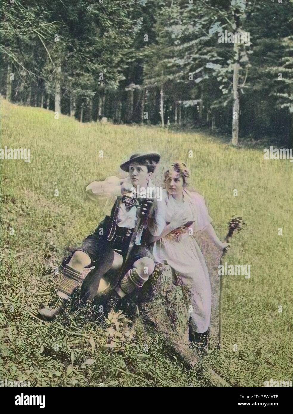 Young couple feels caught at a meeting on the alm, original print from the year 1899, Junges Paar fühlt sich ertappt nach einem heimlichen Treffen auf der Alm, historisch, historical, digital improved reproduction of an original from the 19th century / digitale Reproduktion einer Originalvorlage aus dem 19. Jahrhundert, Originaldatum nicht bekannt, koloriert, handcoloriert, Koloration, digital verbessert Stock Photo