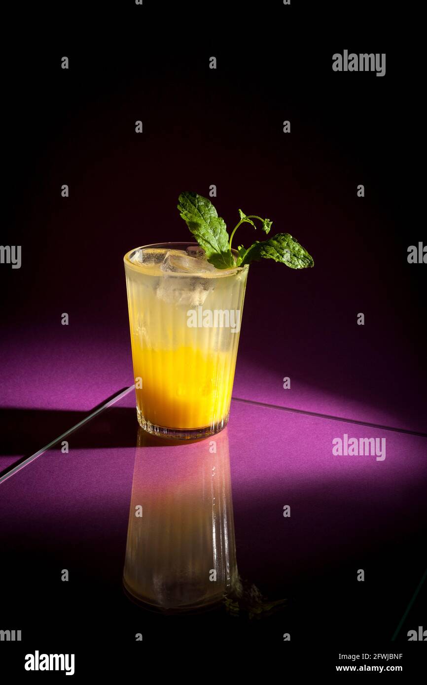 Orange Cocktail With Garnishes Stock Photo