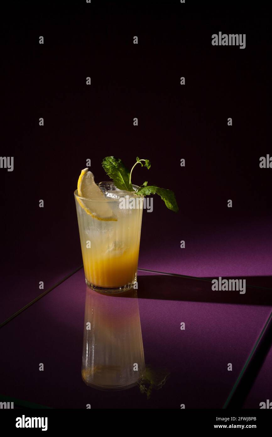 Orange Cocktail With Garnishes Stock Photo