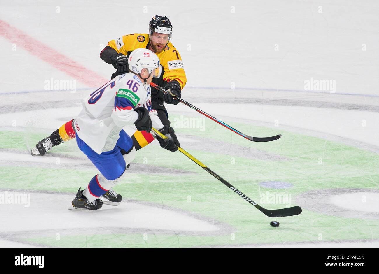 Riga, Latvia. 22nd May, 2021. Maximilian KASTNER, DEB 7 compete, fight for the puck against  Mathias OLIMB, #46 of Norway  NORWAY - GERMANY 1-5 IIHF ICE HOCKEY WORLD CHAMPIONSHIPS Group B  in Riga, Latvia, Lettland, May 22, 2021,  Season 2020/2021 © Peter Schatz / Alamy Live News Credit: Peter Schatz/Alamy Live News Stock Photo
