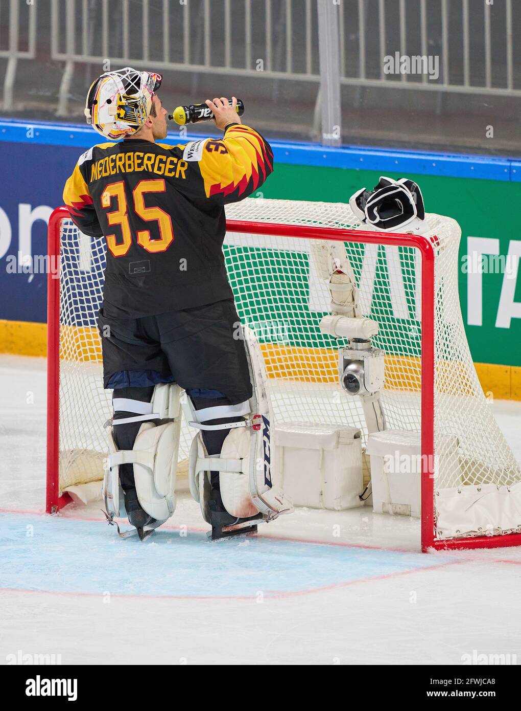 Riga, Latvia. 22nd May, 2021. Mathias NIEDERBERGER, goalkeeper DEB 35 drinks from water bottle, thirst, thirsty, liquid, thirst quencher, isotonic, nutrition, sports nutrition, electrolyte balance, wasser, trinken, getränk,  NORWAY - GERMANY 1-5 IIHF ICE HOCKEY WORLD CHAMPIONSHIPS Group B  in Riga, Latvia, Lettland, May 22, 2021,  Season 2020/2021 © Peter Schatz / Alamy Live News Credit: Peter Schatz/Alamy Live News Stock Photo