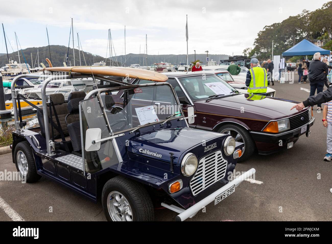 1981 British leyland Mini moke californian with surfboard on the roof at an Australian classic car show in Sydney,NSW,Australia Stock Photo