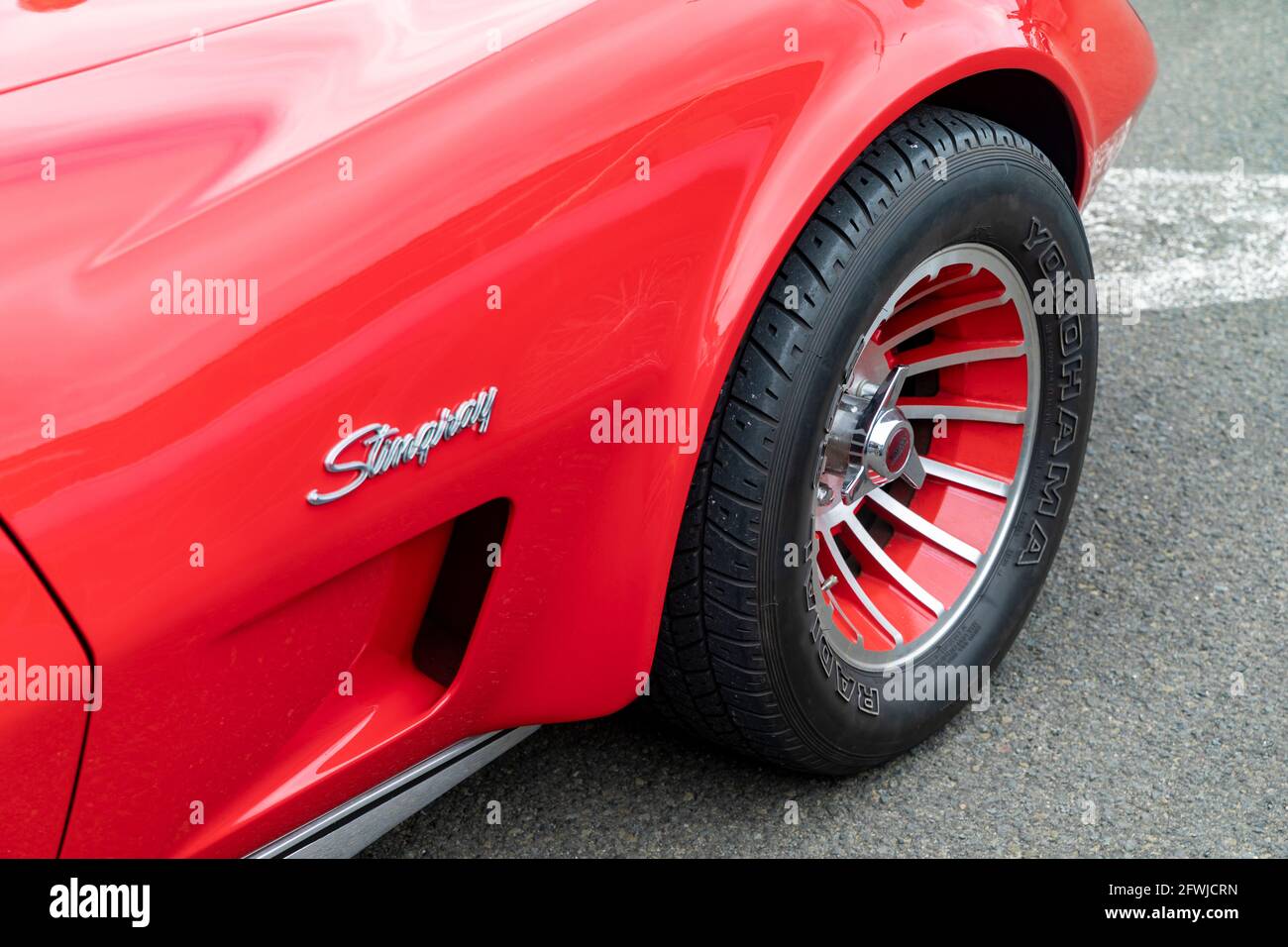 Corvette stingray close up of front drivers side wing and wheel tyre and badge Stock Photo