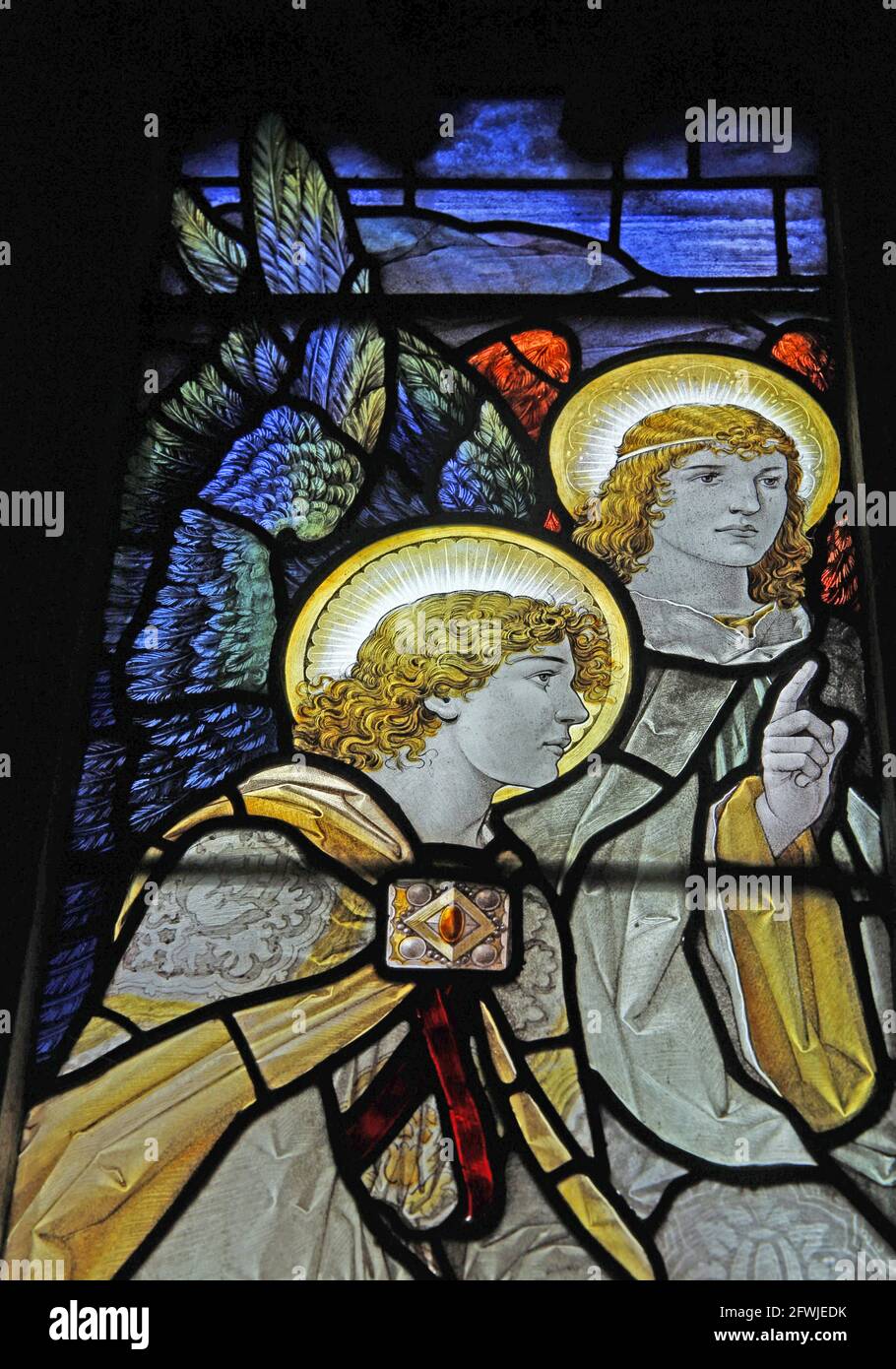 Stained glass window by Percy Bacon & Brothers depicting the angels at the tomb of Christ, St Andrew's Church, Leigh, Dorset Stock Photo