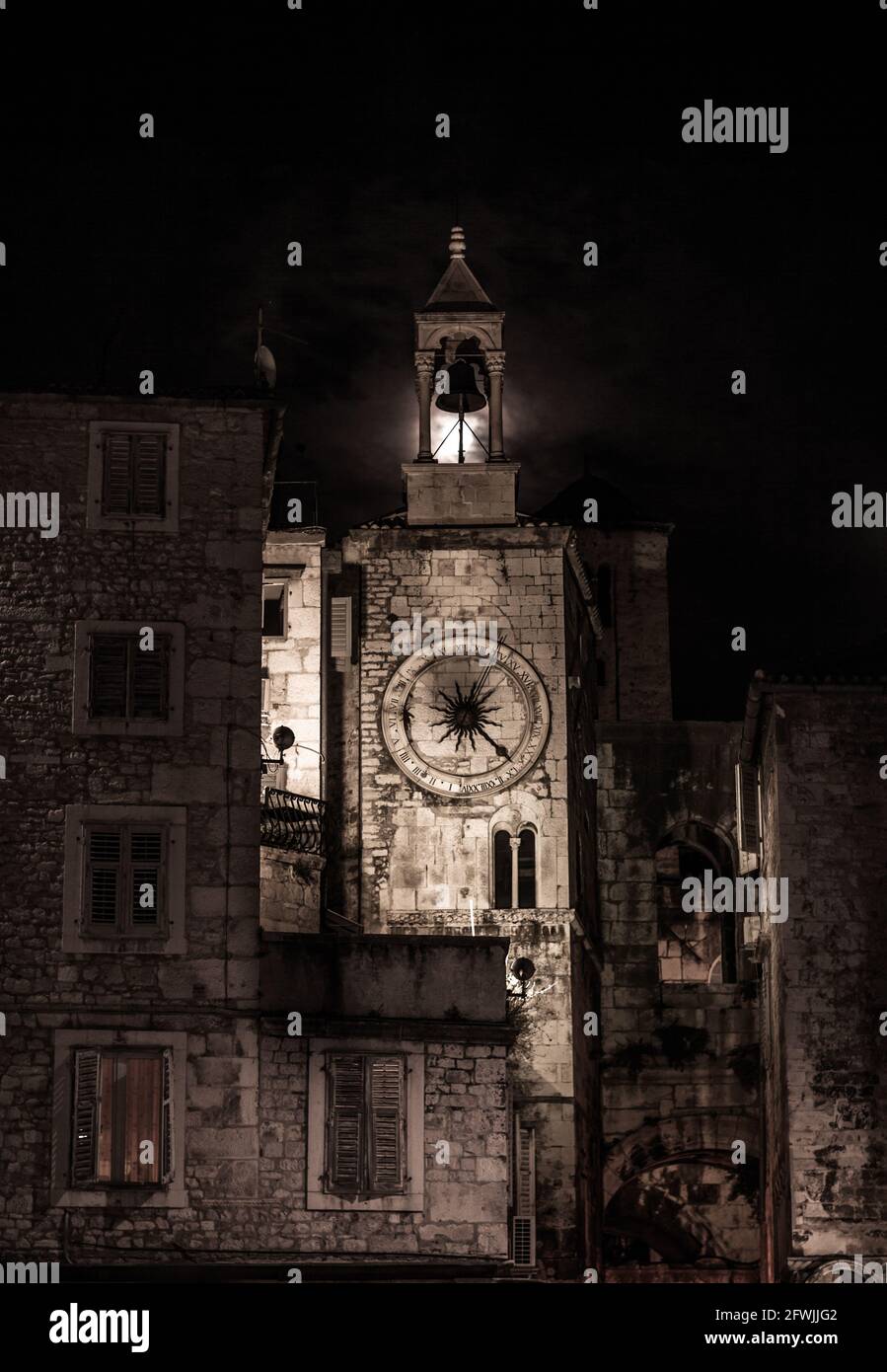 The Old Town Clock (A Romanesque tower with a Renaissance town clock ) and the adjacent entry to the Diocletian Palace via the iron gate in the old to Stock Photo