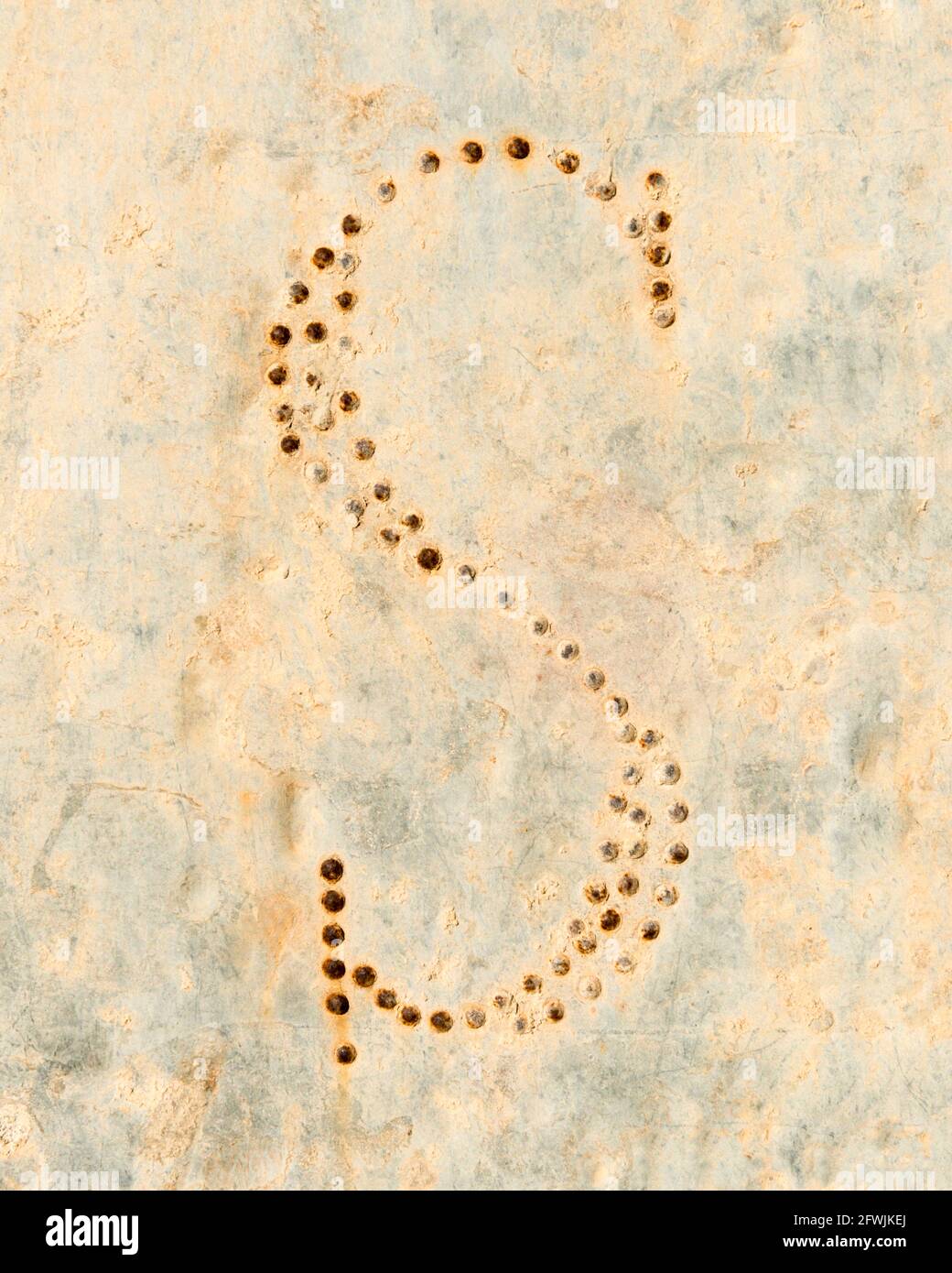 Letter S made up of rusty nails Stock Photo