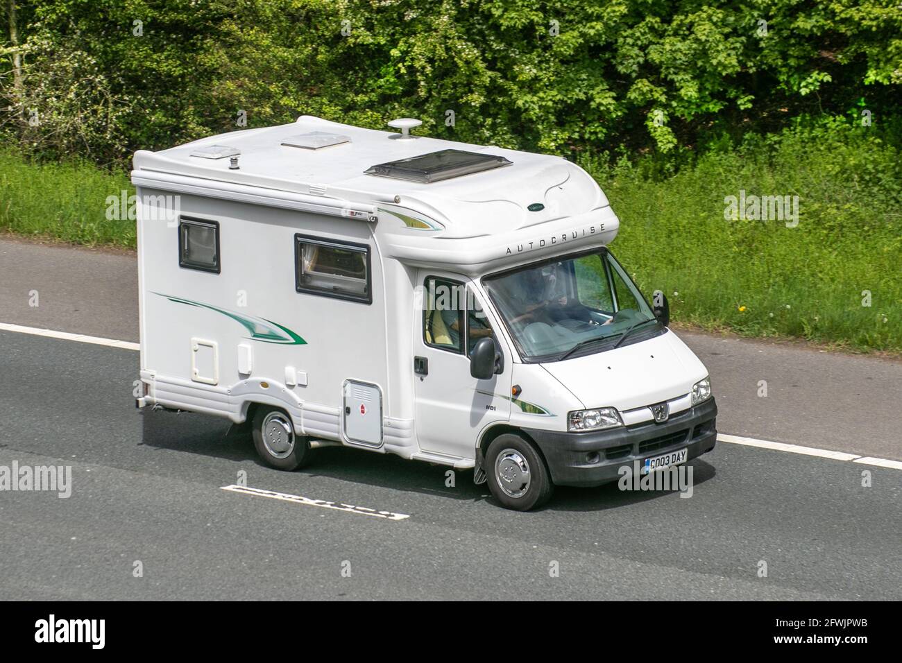 Peugeot AutoCruise 2200cc diesel van; Caravans and Motorhomes, campervans on Britain's roads, RV leisure vehicle, family holidays, caravanette vacations, Touring caravan holiday, van conversions, Vanagon autohome, life on the road,  auto-sleeper Stock Photo