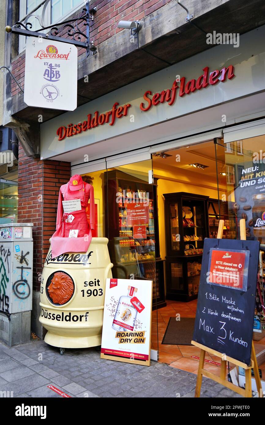 Löwensenf shop exterior in Düsseldorf. Löwensenf is a Düsseldorf mustard specialty with a long tradition, made of 100 % natural ingredients. Stock Photo