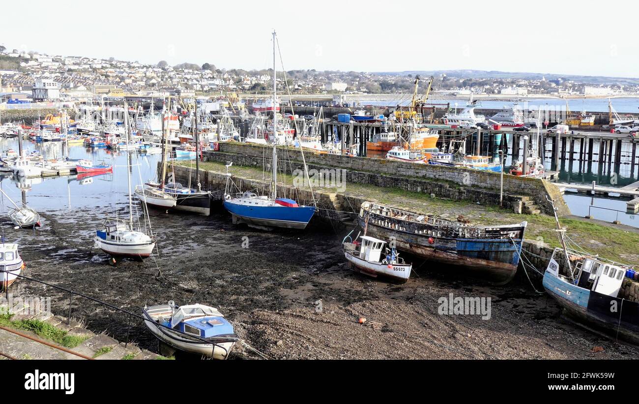 Newlyn harbour, with the old medieval harbour with the new harbour behind, Newlyn and Penzance, Cornwall, UK. Stock Photo