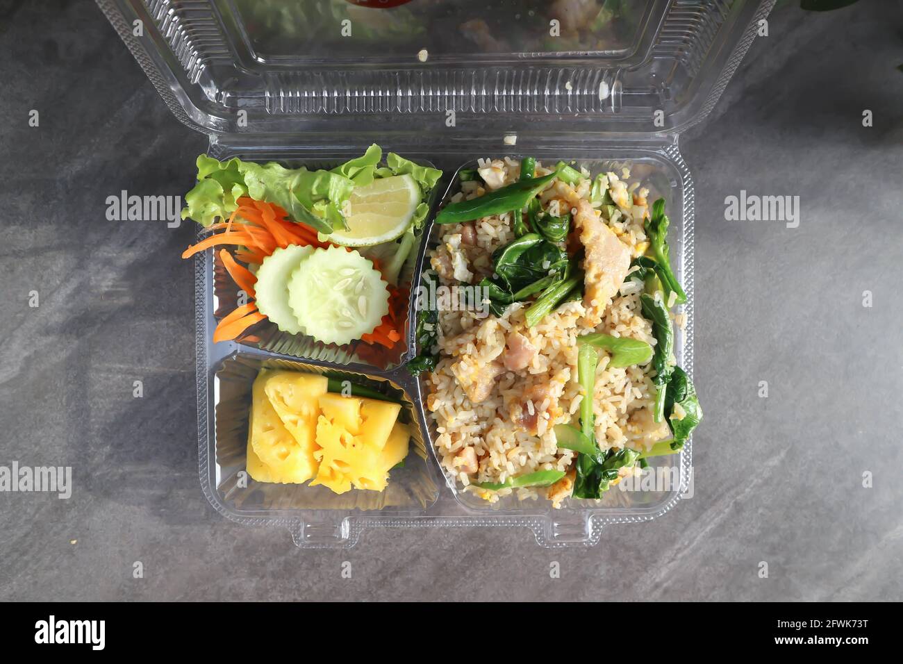 stir fried rice with vegetable and pineapple in the box Stock Photo - Alamy