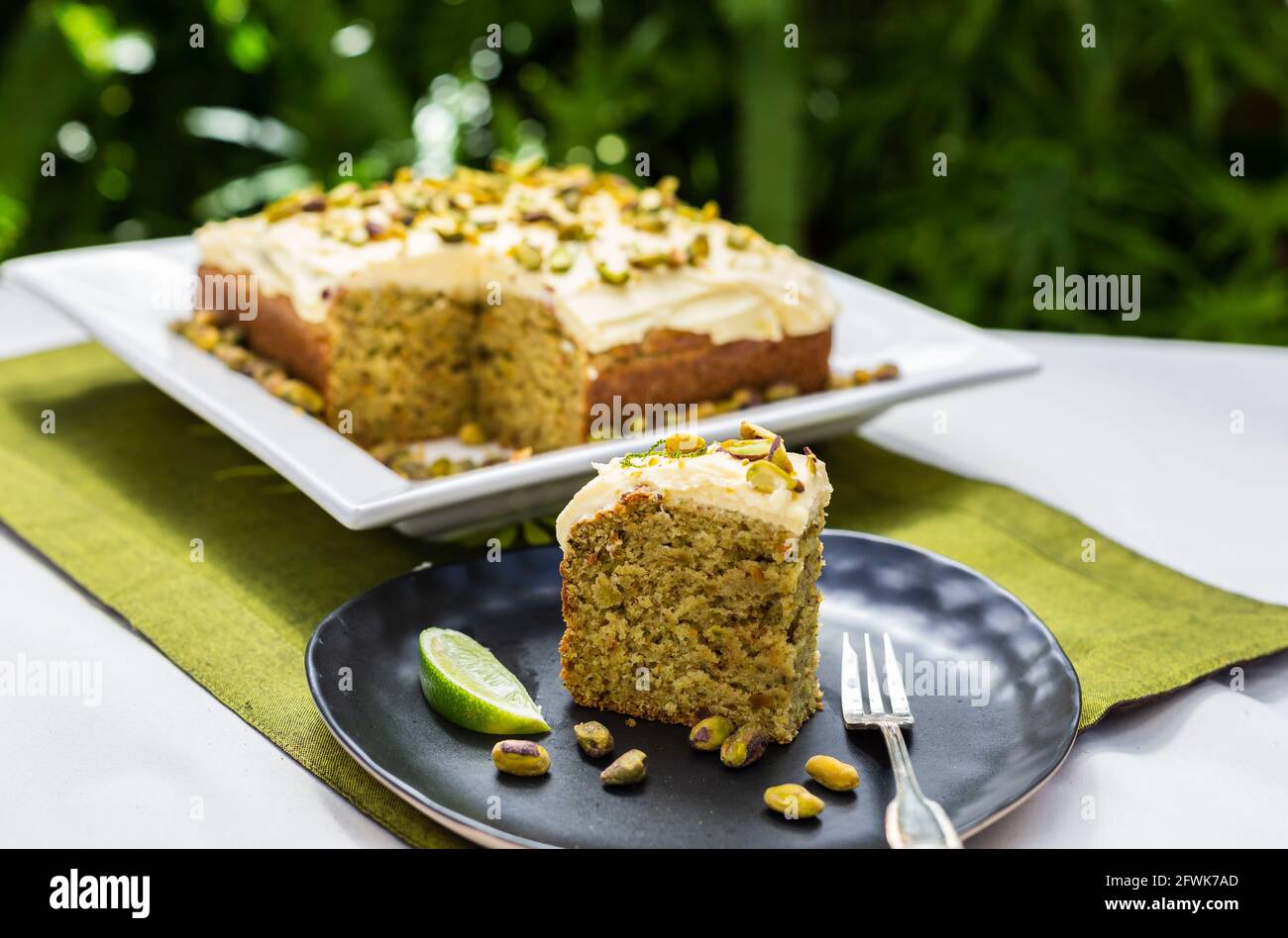 homemade, snack, baked, lime and pistachio cake, nobody, outdoors, on one, splade, table, gourmet, cooked, fresh, tasty, delicious, cake, cream, decor Stock Photo