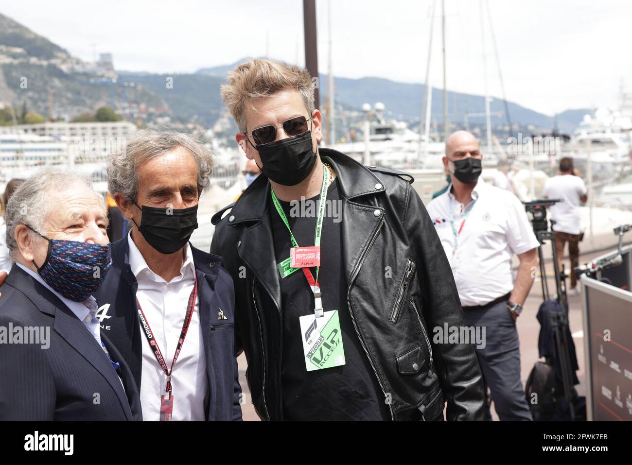 (L to R): Jean Todt (FRA) FIA President with Alain Prost (FRA) Alpine F1 Team Non-Executive Director and Benjamin Biolay (FRA) Singer. Monaco Grand Prix, Sunday 23rd May 2021. Monte Carlo, Monaco. Stock Photo