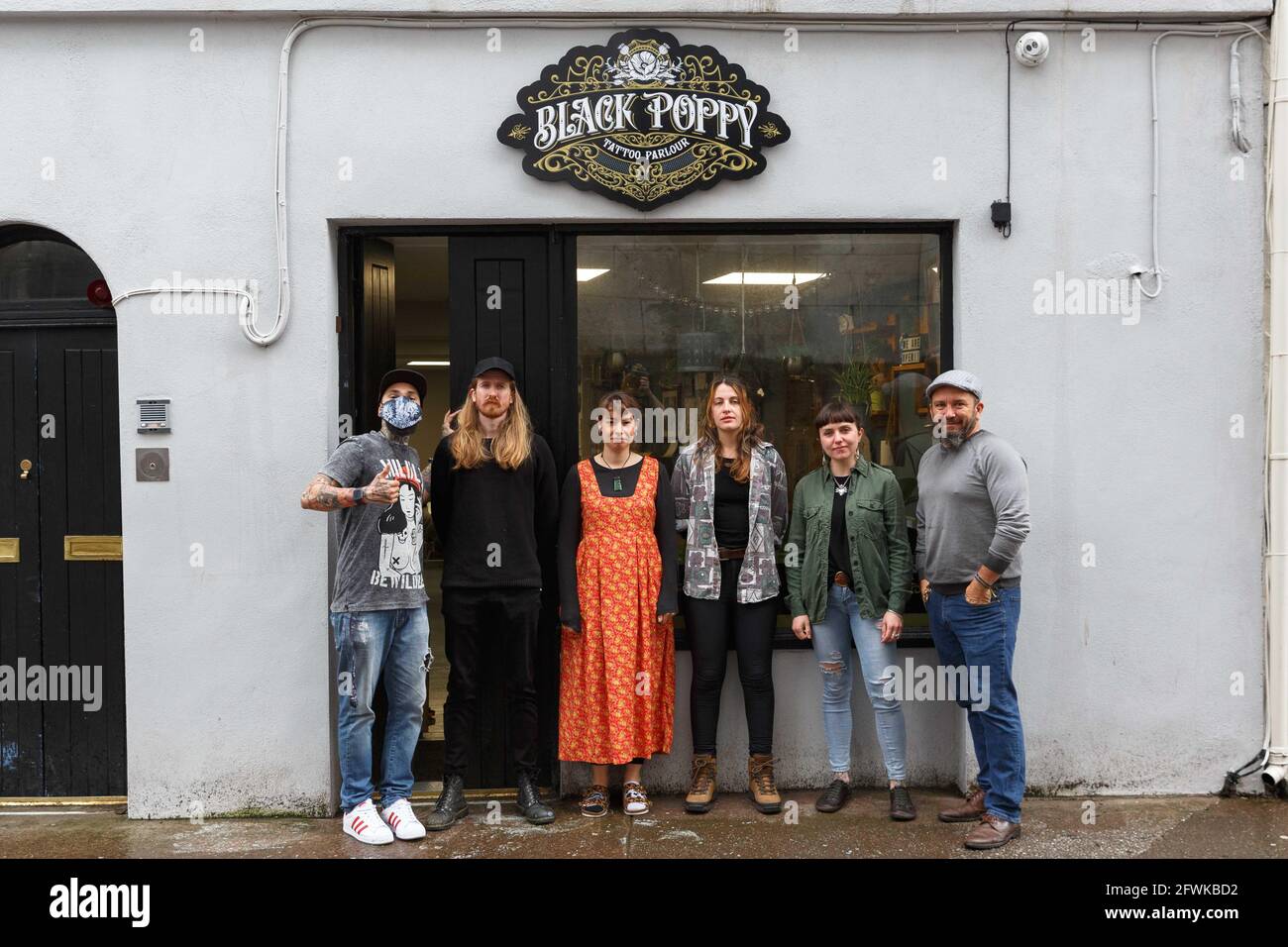 Cork, Ireland, 23rd May 2021. Black Poppy Tattoo Parlour Charity Event in Aid of Palestine Children's Relief Fund, Cork, Ireland. Pictured (LToR) are Andre Paula, Rob Sexton, Kim Cortis, Aoife Tierney, Gin Barbara Naggi (Owner), and Jake Stahlecker (Owner) Black Poppy Tattoo Parlour in Father Matthew Street, Cork ran a charity tattoo event today in aid of the Palestine Children's Relief Fund. Credit: Damian Coleman/Alamy Live News Stock Photo