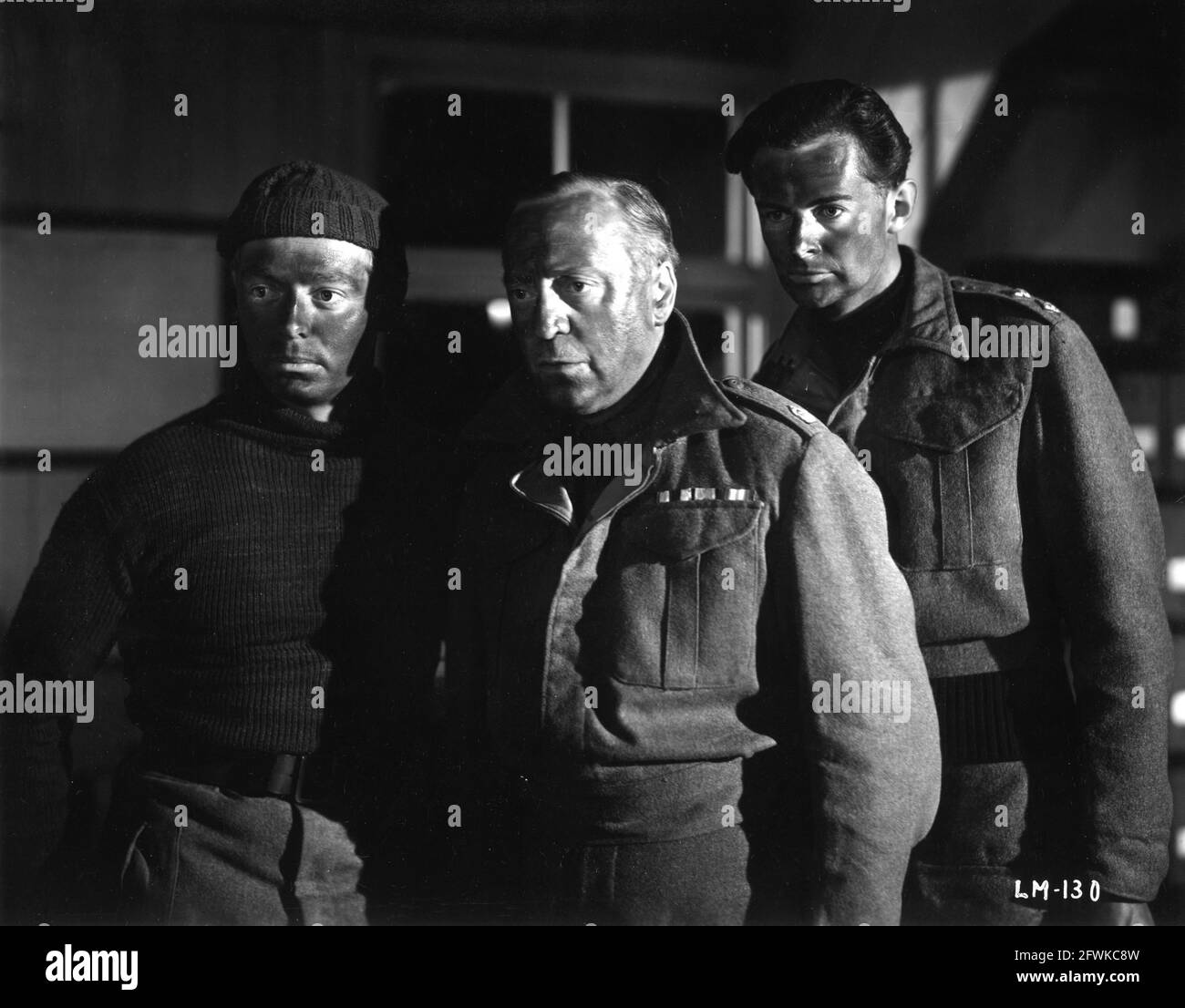 JIMMY HANLEY BASIL RADFORD and DEREK BOND in THE CAPTIVE HEART 1946 director BASIL DEARDEN original story Patrick Kirwan screenplay Angus MacPhail and Guy Morgan art direction Michael Relph producer Michael Balcon Ealing Studios / Eagle-Lion Distributors Limited Stock Photo