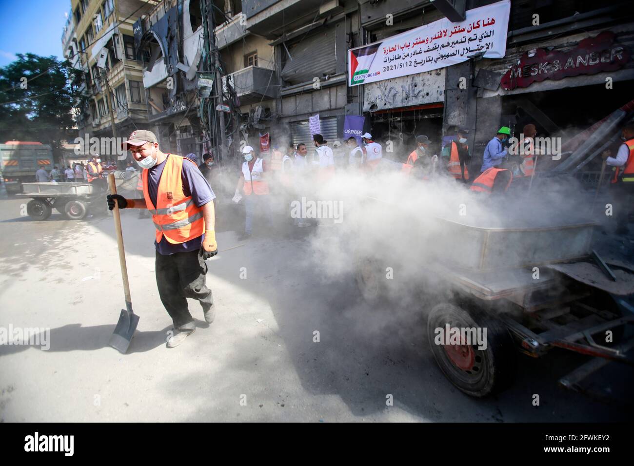Gaza Clean Gaza, Palestine. 23rd May, 2021. Volunteers clean up the streets in the ...