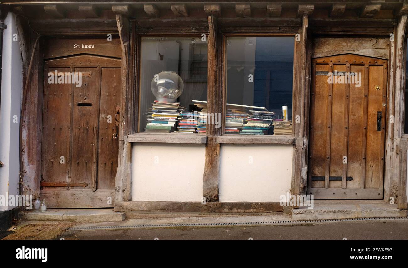 May 2021 - Stack of Books in the window of an old shop in the Somerset ...