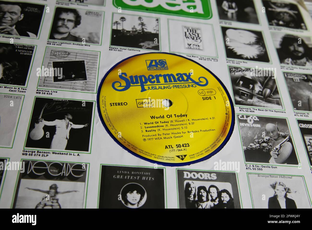 Viersen, Germany - May 9. 2021: Closeup of isolated vinyl record sleeve with presentation of different artists with yellow supermax band album label ( Stock Photo