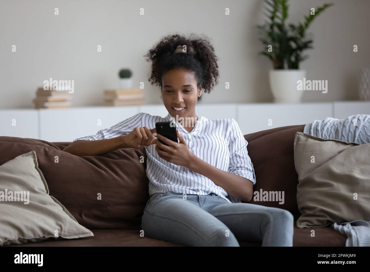 Relaxed young multiracial woman hi-res stock photography and images - Alamy