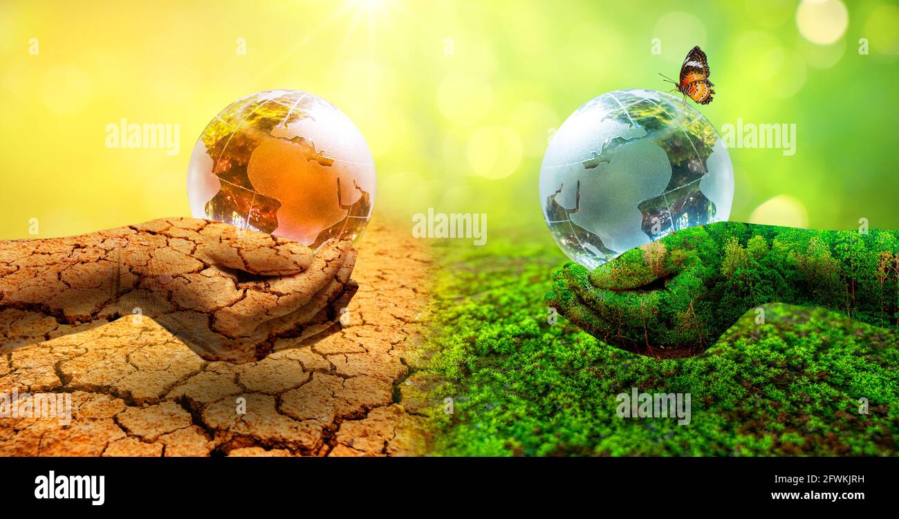 Two orb hands with very different environments Earth Day or World Environment Day Global Warming and Pollution Stock Photo