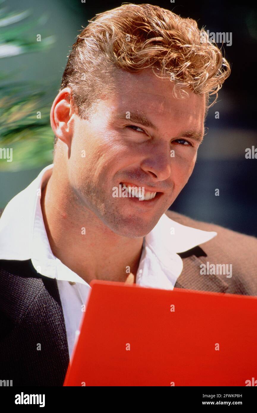 Business. Close up of young man outdoors. Stock Photo