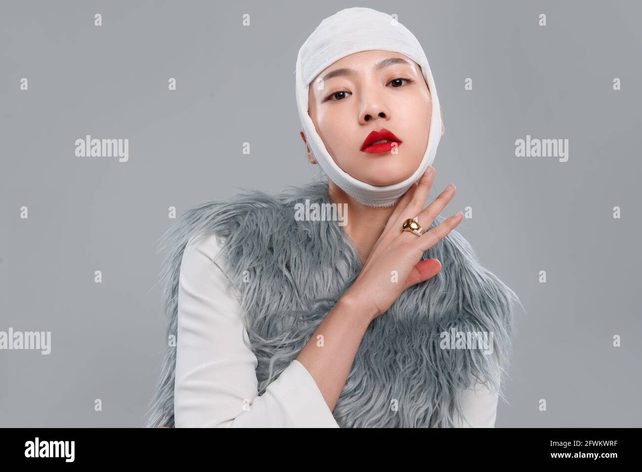 Charming asian woman wearing hi-res stock photography and images - Alamy